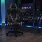 Sillón reclinable gamer de piel sintética BlackArc - Brazos pivotantes ajustables en altura, reposapiés extraíble, cojines para la cabeza y lumbares